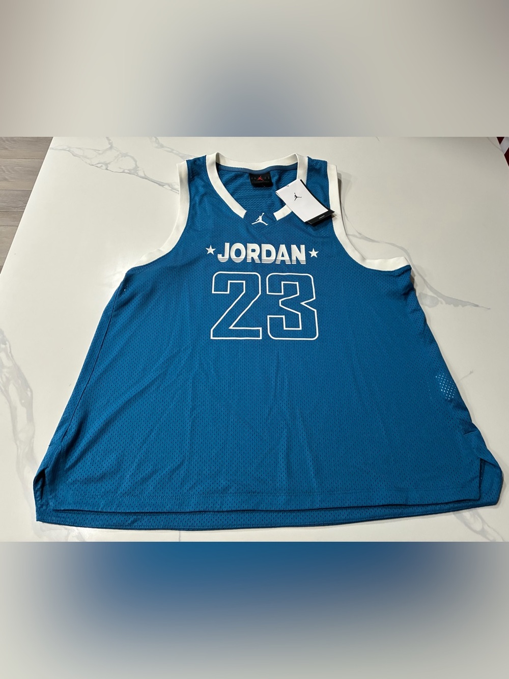 Jordan Brand Retro Women’s Loose Fit Basketball Jersey (Medium) Retails For $58